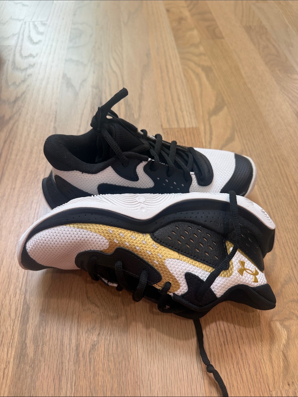 Under Armour Kids Sz 4Y Black White and Gold Sneakers NEW IN BOX